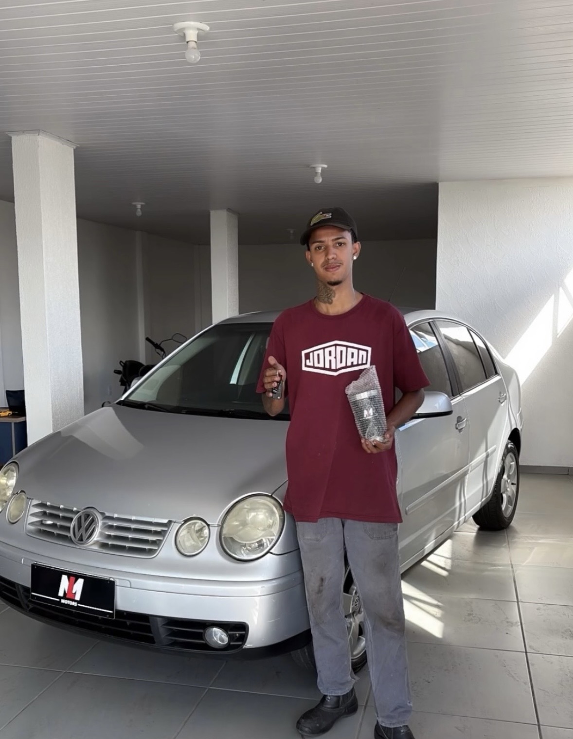 Cliente com VW Polo sedan